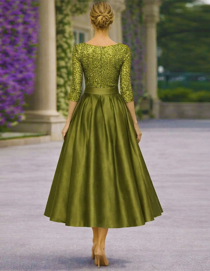 Vestido midi de patchwork bicolor con mangas tres cuartos