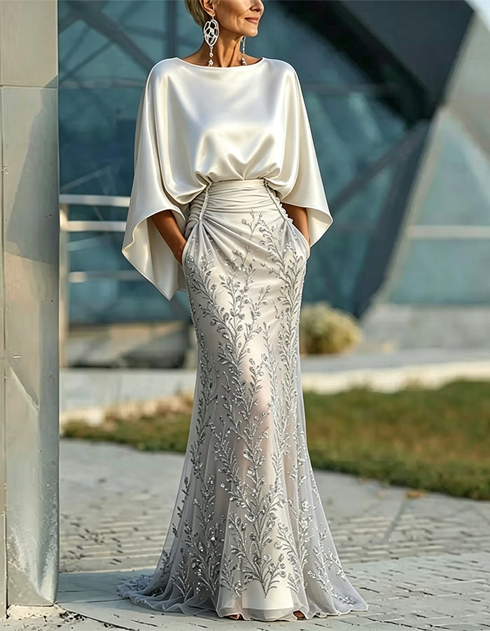 Weißes Maxikleid mit Schalärmeln und silbernem Pailletten-Meerjungfrauen-Design
