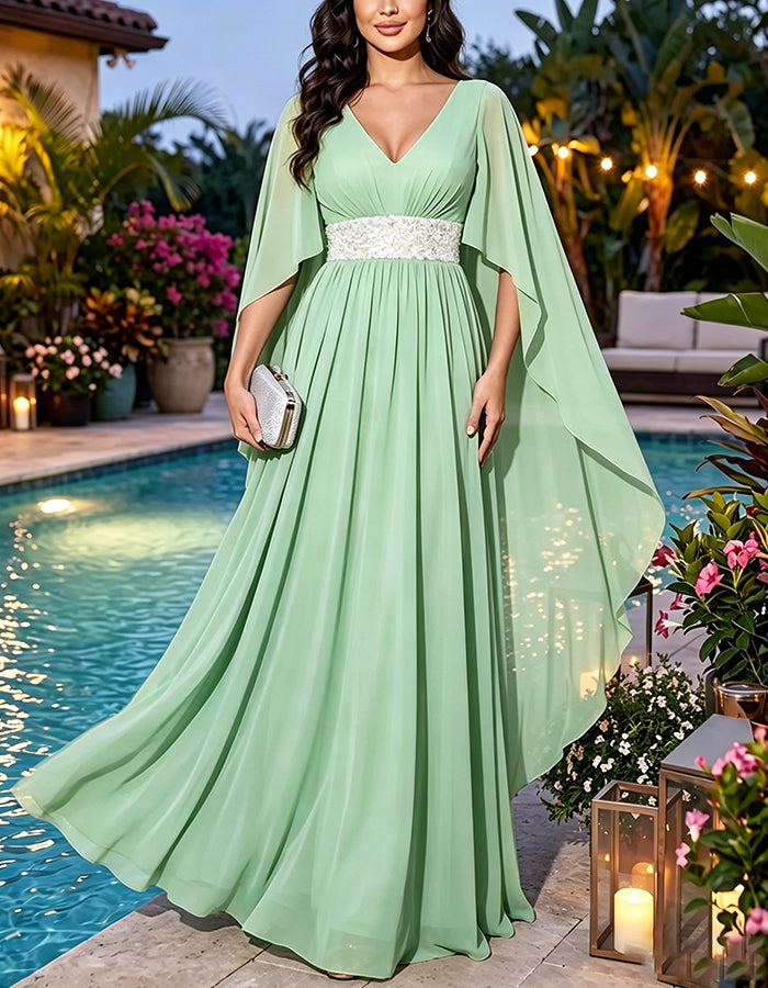 Vestido maxi esvoaçante de chiffon com decote em V, mangas tipo capa, lantejoulas e cintura marcada