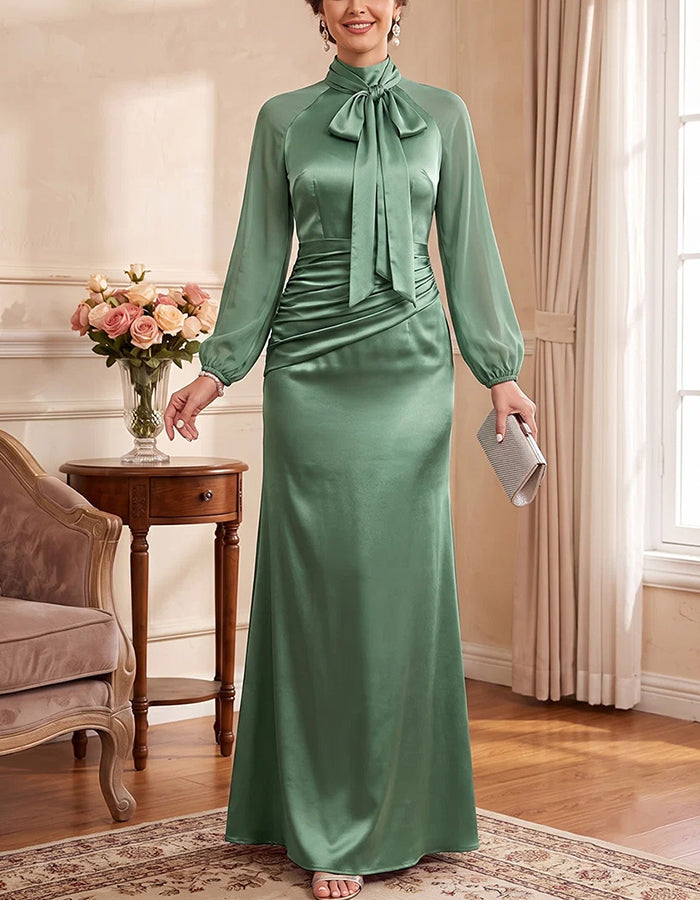 Vestido largo de satén verde salvia, con lazo en el cuello y mangas largas
