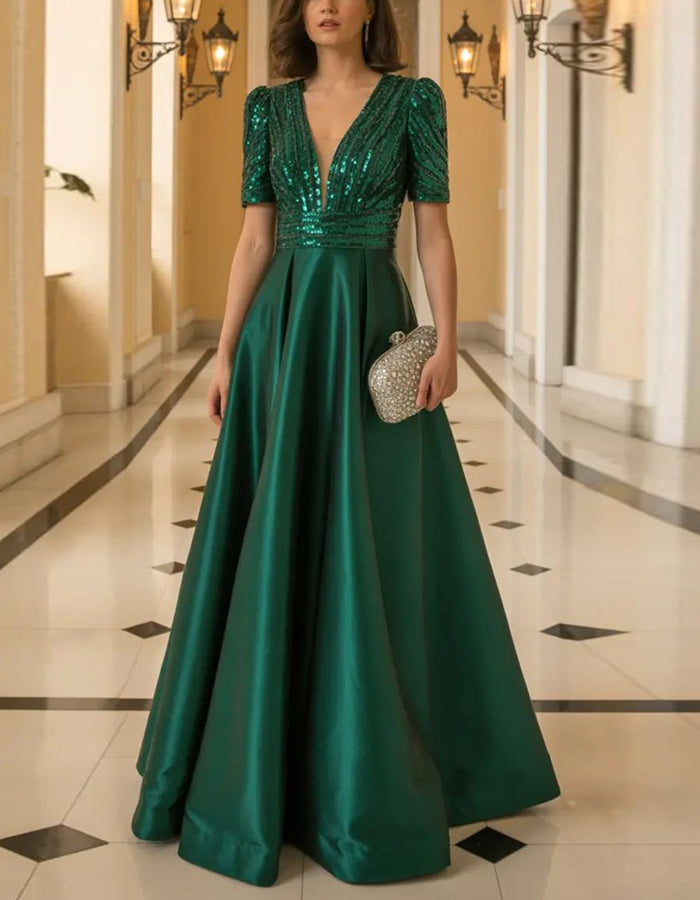 Abito lungo in raso verde con paillettes, maniche corte e scollo a V profondo