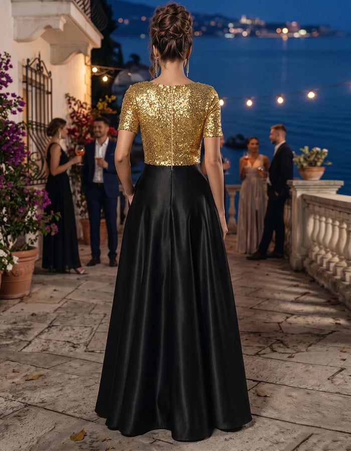 Abito maxi in raso con paillettes, girocollo, maniche corte e motivo bicolore oro e nero