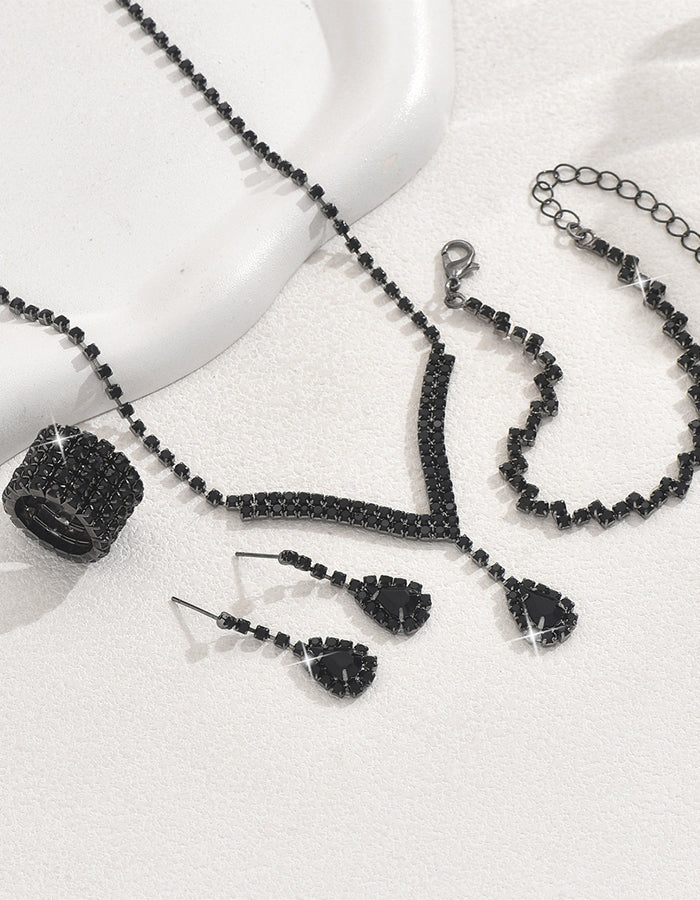 Set da 4 pezzi con collana, orecchini, bracciale e anello a forma di goccia d’acqua
