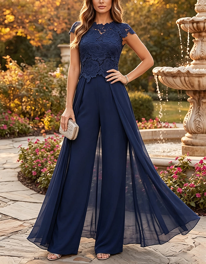 Combinaison-pantalon bleu marine avec dentelle, manches courtes, superposition en mousseline et jambes larges