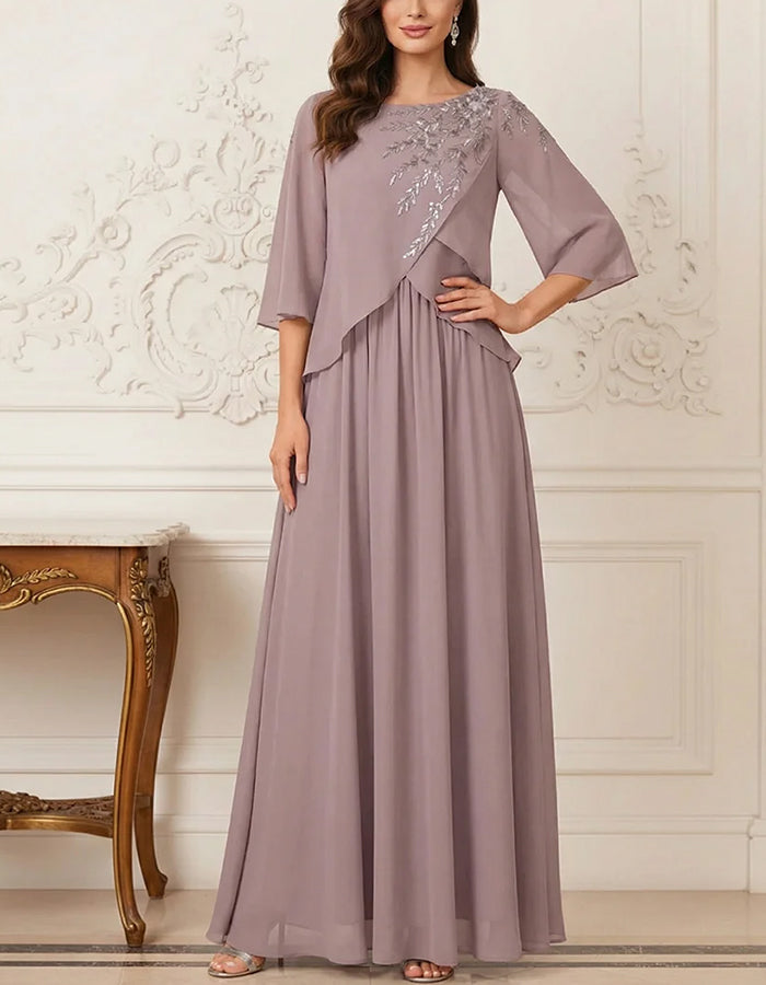 Robe longue évasée en mousseline à superposition asymétrique et manches 3/4 évasées
