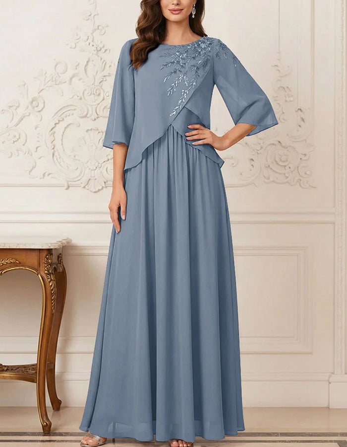 Robe longue évasée en mousseline à superposition asymétrique et manches 3/4 évasées