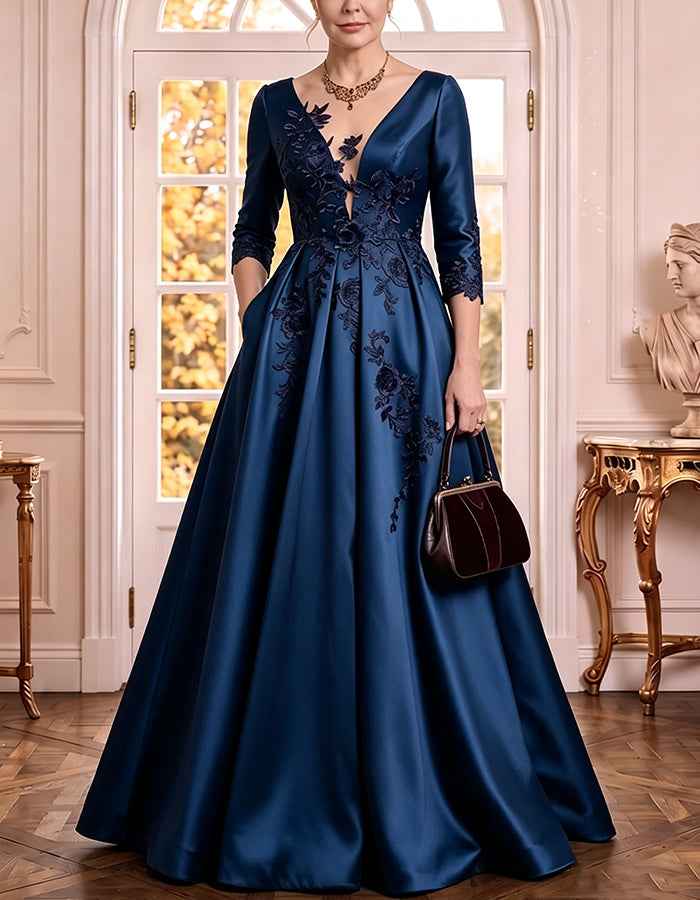 Vestido comprido de cetim com decote em V profundo, mangas 3/4, aplicações florais de renda e corte em linha A