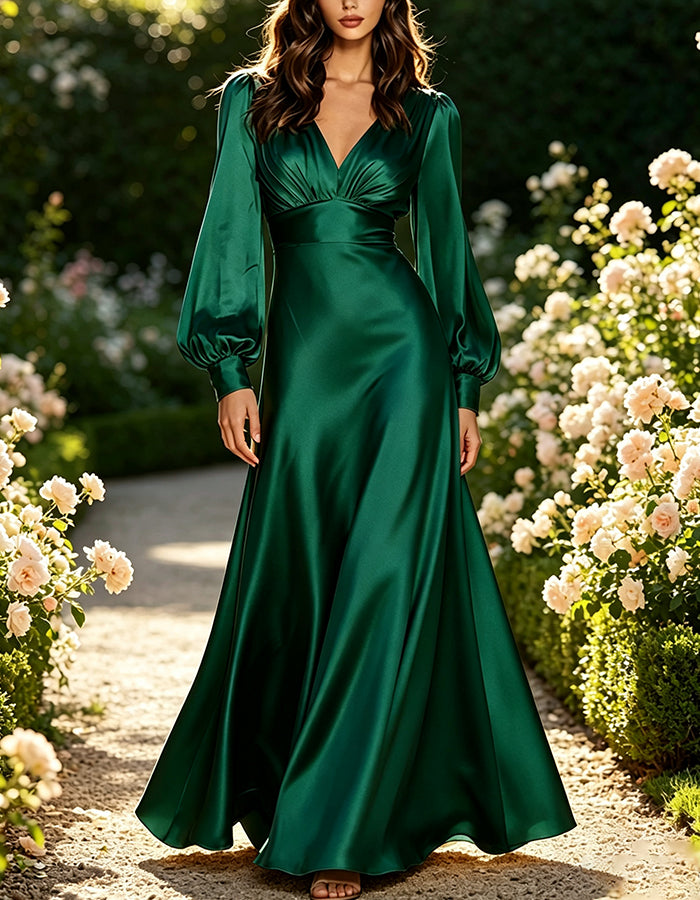 Robe longue trapèze en satin avec décolleté plongeant en V et manches longues bouffantes