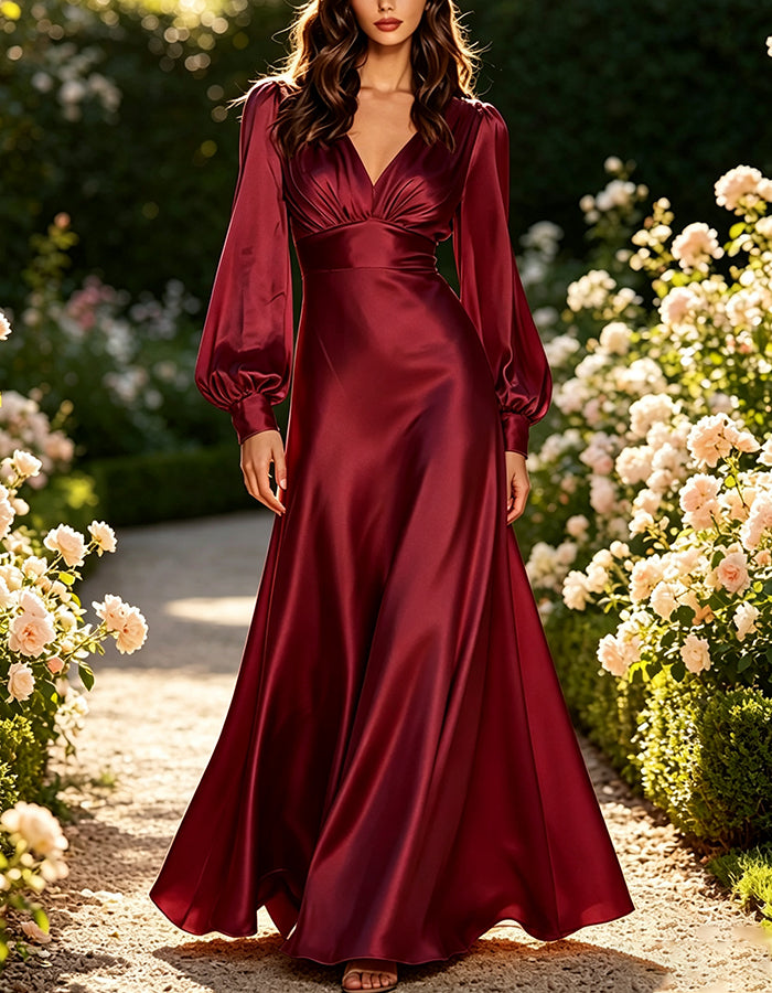 Robe longue trapèze en satin avec décolleté plongeant en V et manches longues bouffantes