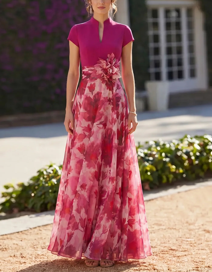 Vestido largo de gasa con estampado floral, cuello alto y color liso