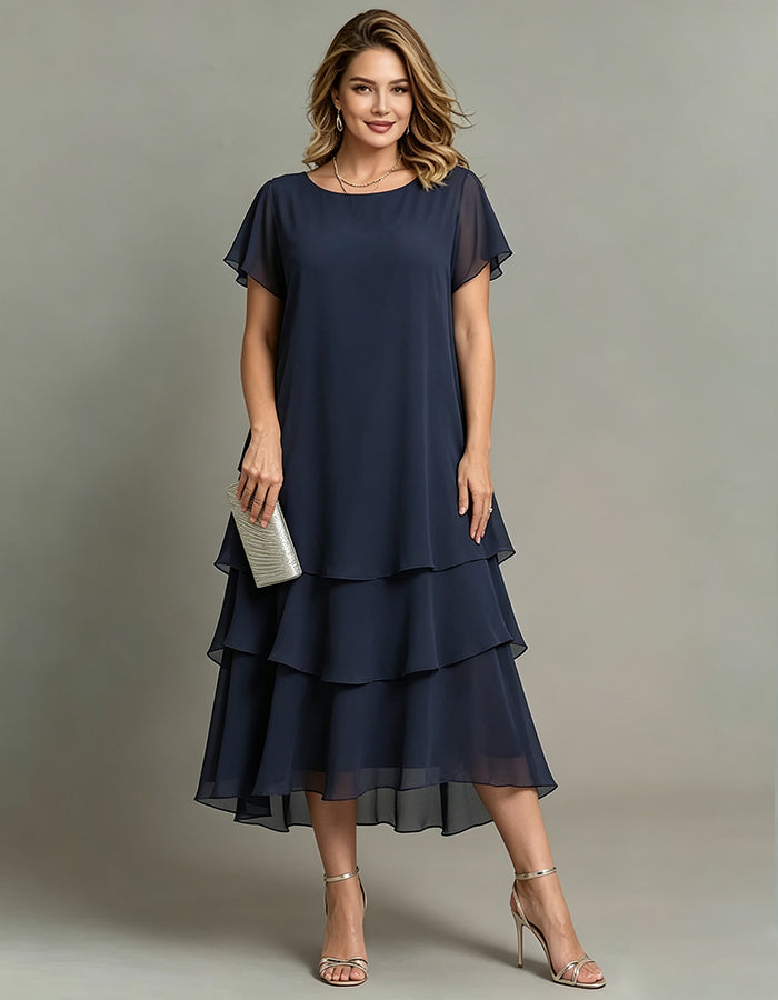 Vestido midi holgado de gasa azul marino, con cuello redondo y capas