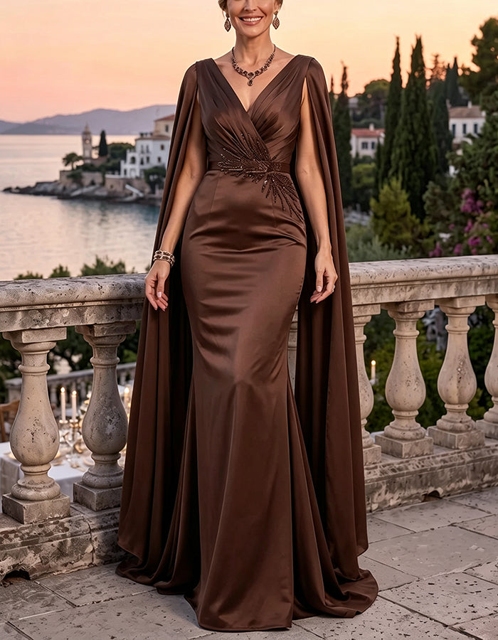 Vestido largo de lentejuelas con escote profundo en V, mangas tipo capa y cintura fruncida