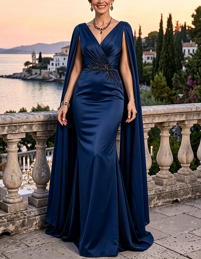 Vestido largo de lentejuelas con escote profundo en V, mangas tipo capa y cintura fruncida