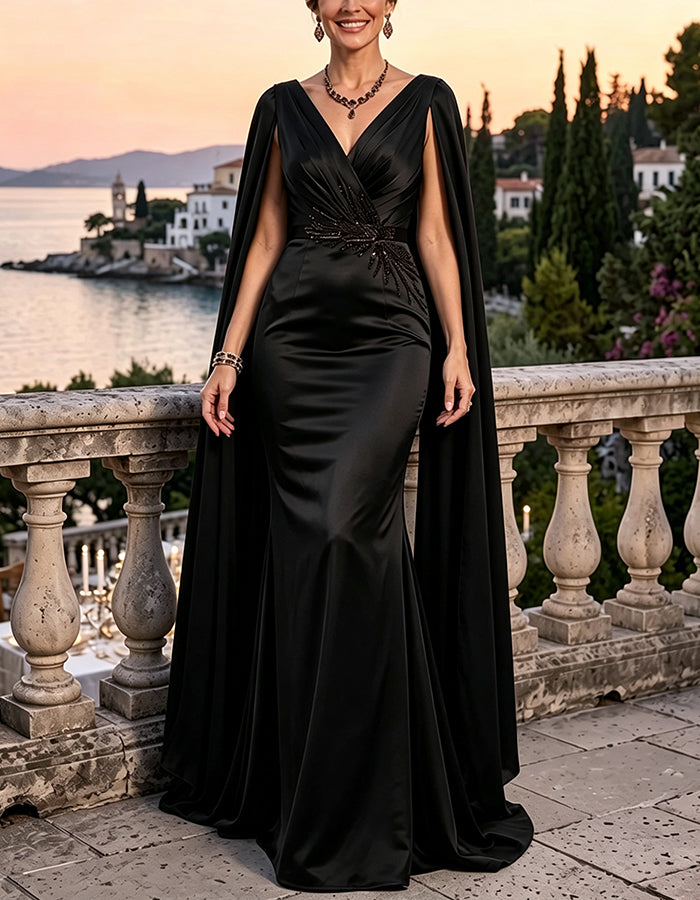 Vestido largo de lentejuelas con escote profundo en V, mangas tipo capa y cintura fruncida