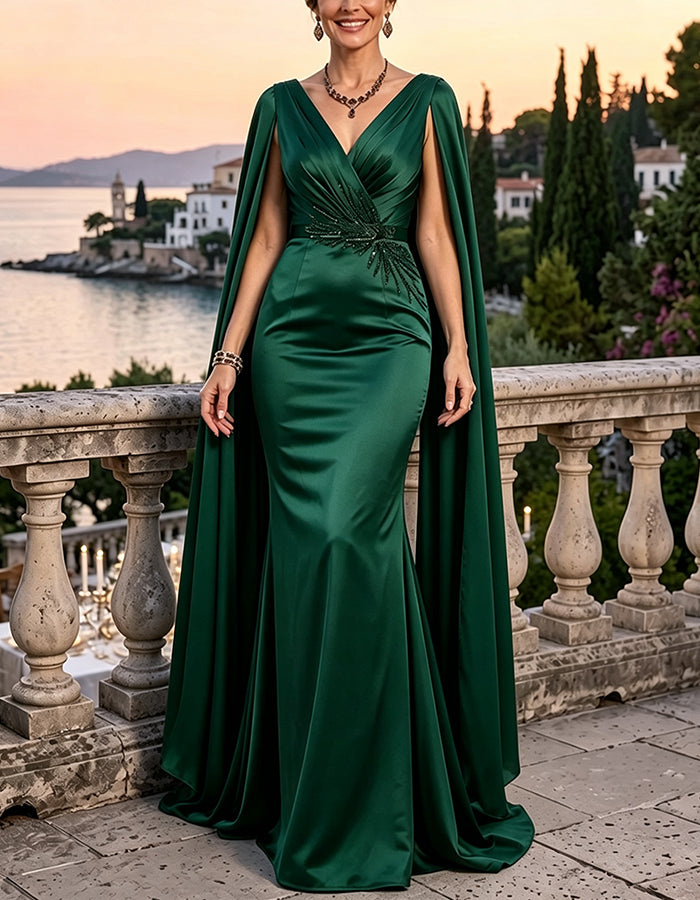 Vestido largo de lentejuelas con escote profundo en V, mangas tipo capa y cintura fruncida