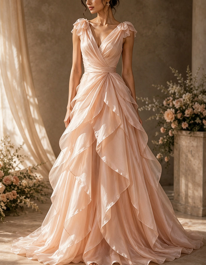 Vestido largo de organza con escote profundo en V, hombros con volantes, lazo y cintura cruzada con torsión