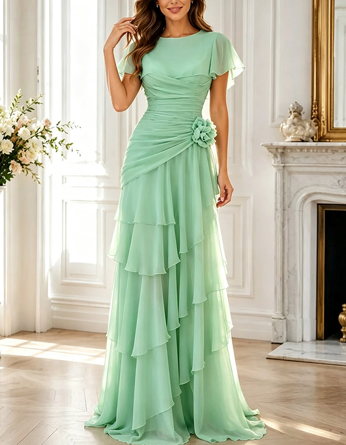 Abito lungo in chiffon con scollo rotondo, maniche ad aletta, balze e fiore 3D