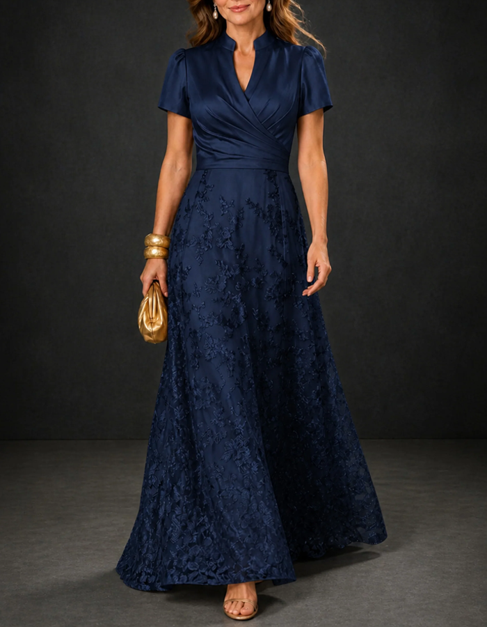 Abito lungo elegante in raso con colletto rialzato con revers, maniche corte a sbuffo, pizzo floreale e linea ad A