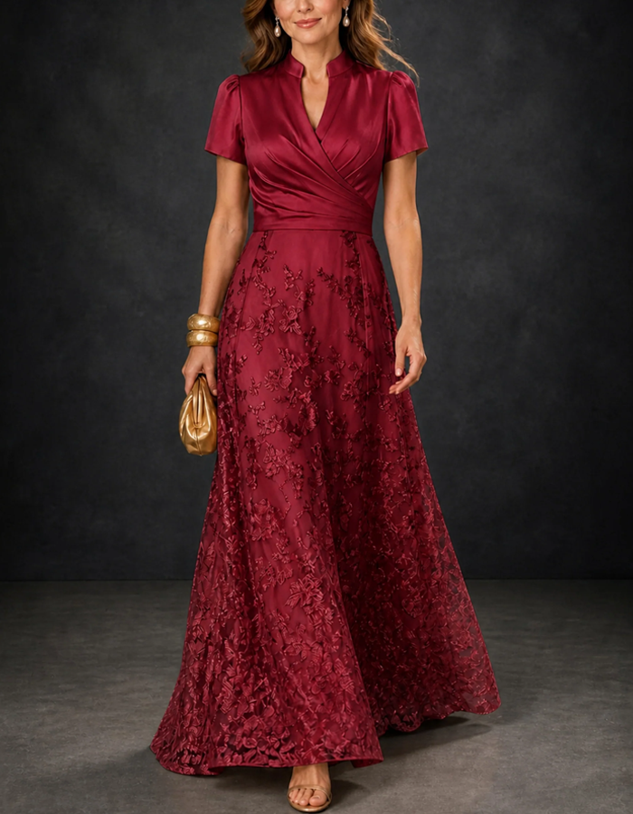 Abito lungo elegante in raso con colletto rialzato con revers, maniche corte a sbuffo, pizzo floreale e linea ad A