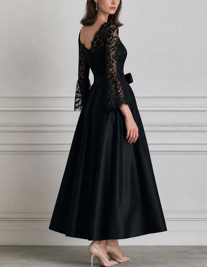 Abito midi in raso nero con spalle scoperte, pizzo e maniche a campana