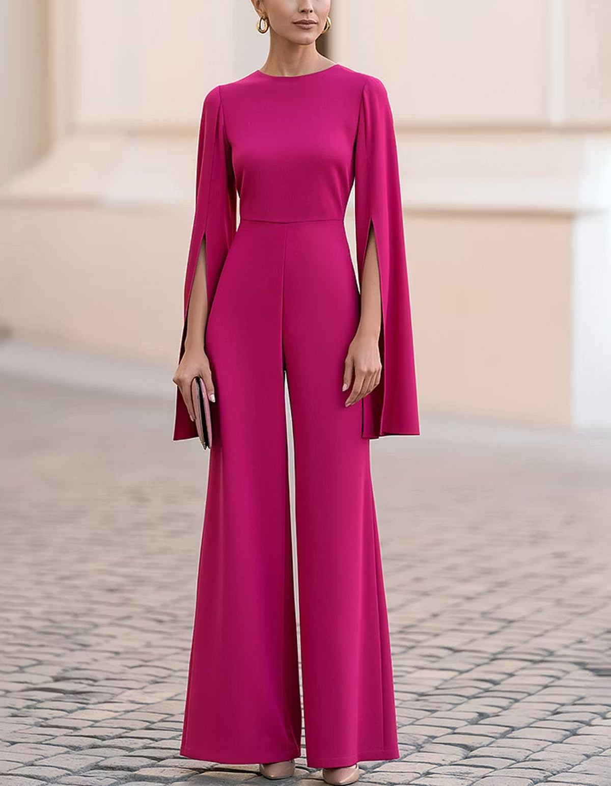 Tuta con maniche a mantella color magenta e gamba ampia