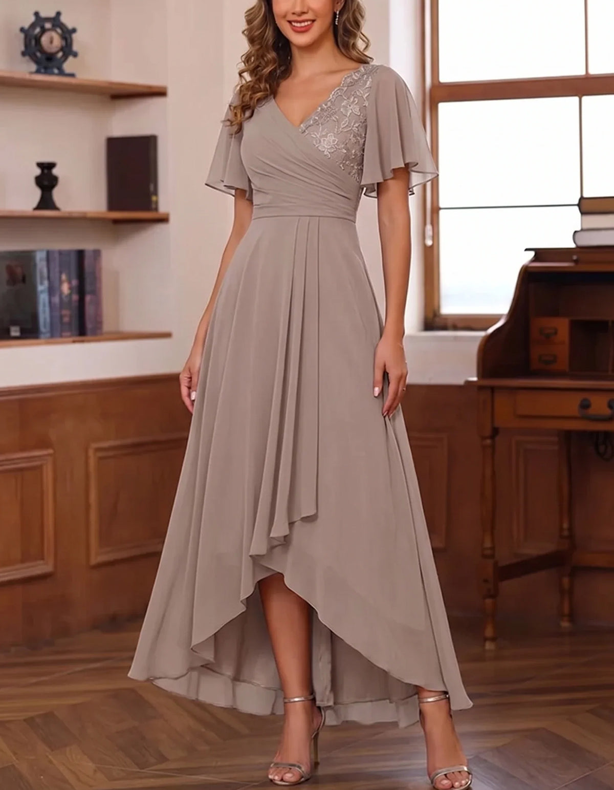 Rochie maxi din șifon, cu decolteu în V, mâneci fluture și lungime asimetrică