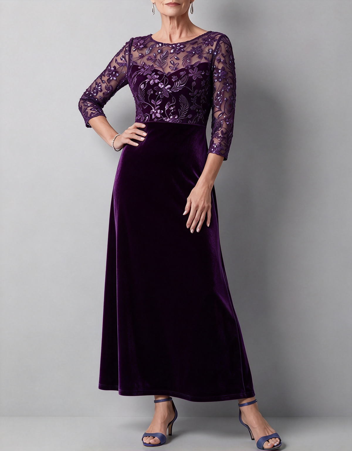 Vestido midi de corte em A, com gola redonda, mangas 3/4, lantejoulas, renda e veludo