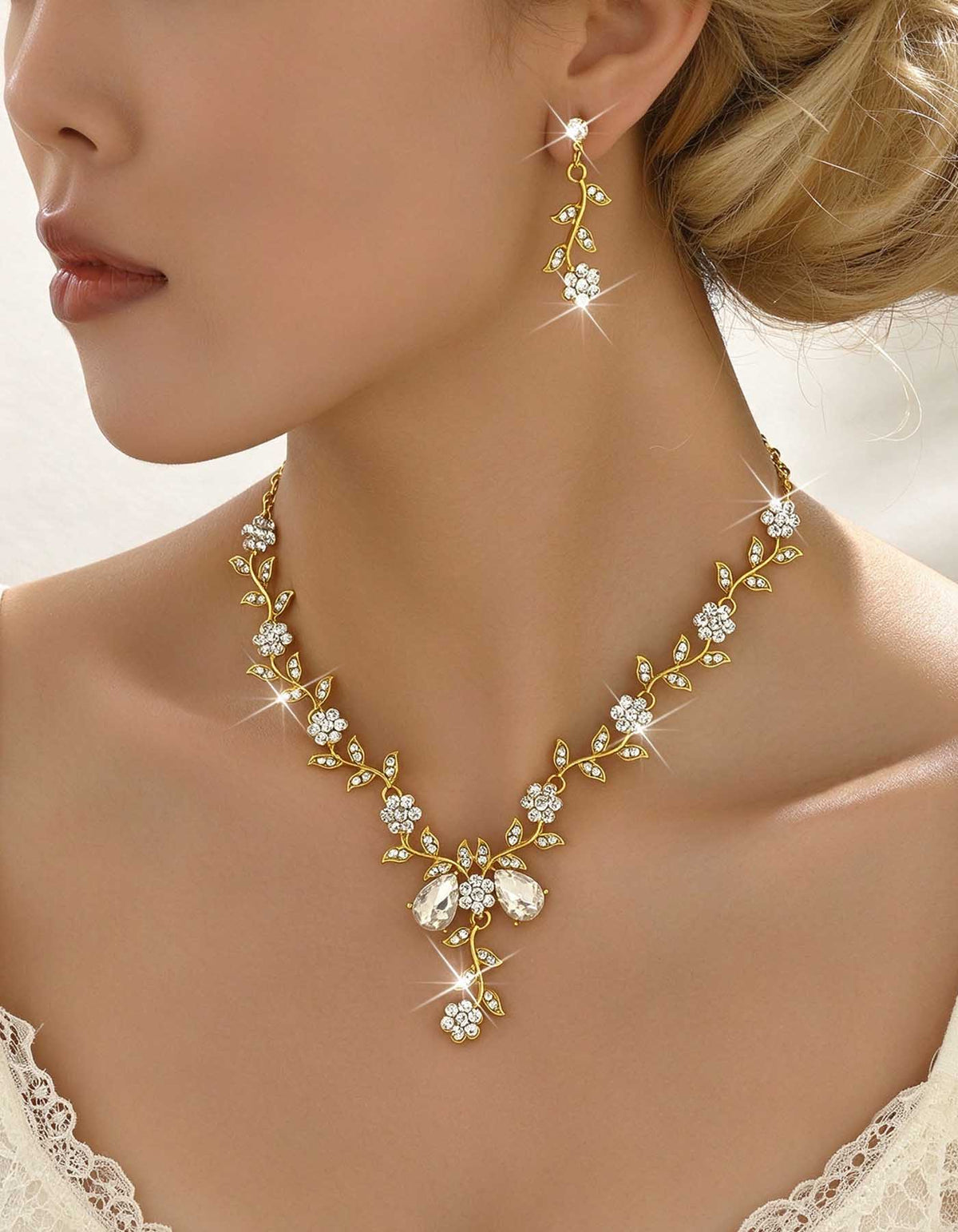 Goldfarbenes florales Weinranken-Rhinstein-Brautschmuck-Set