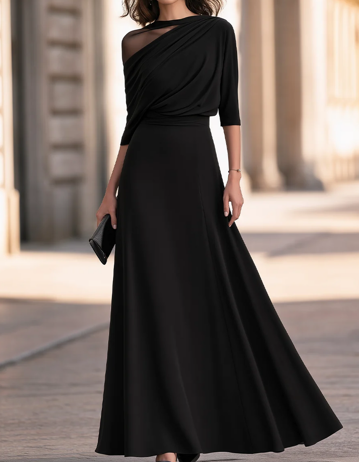 Vestido largo de gasa negra con drapeado asimétrico y corte evasé