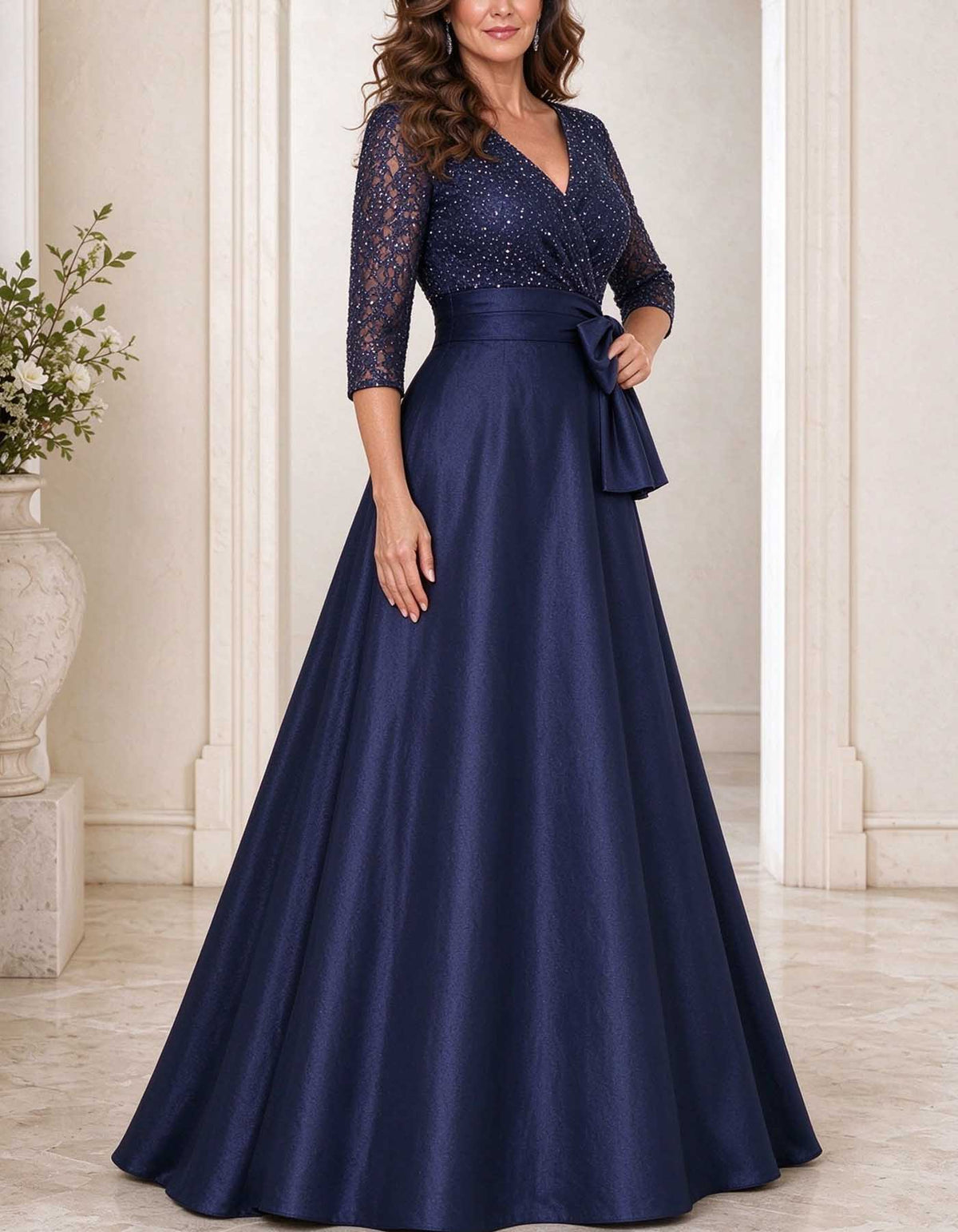 Robe longue bleu marine à décolleté en V, corsage à sequins et nœud en satin