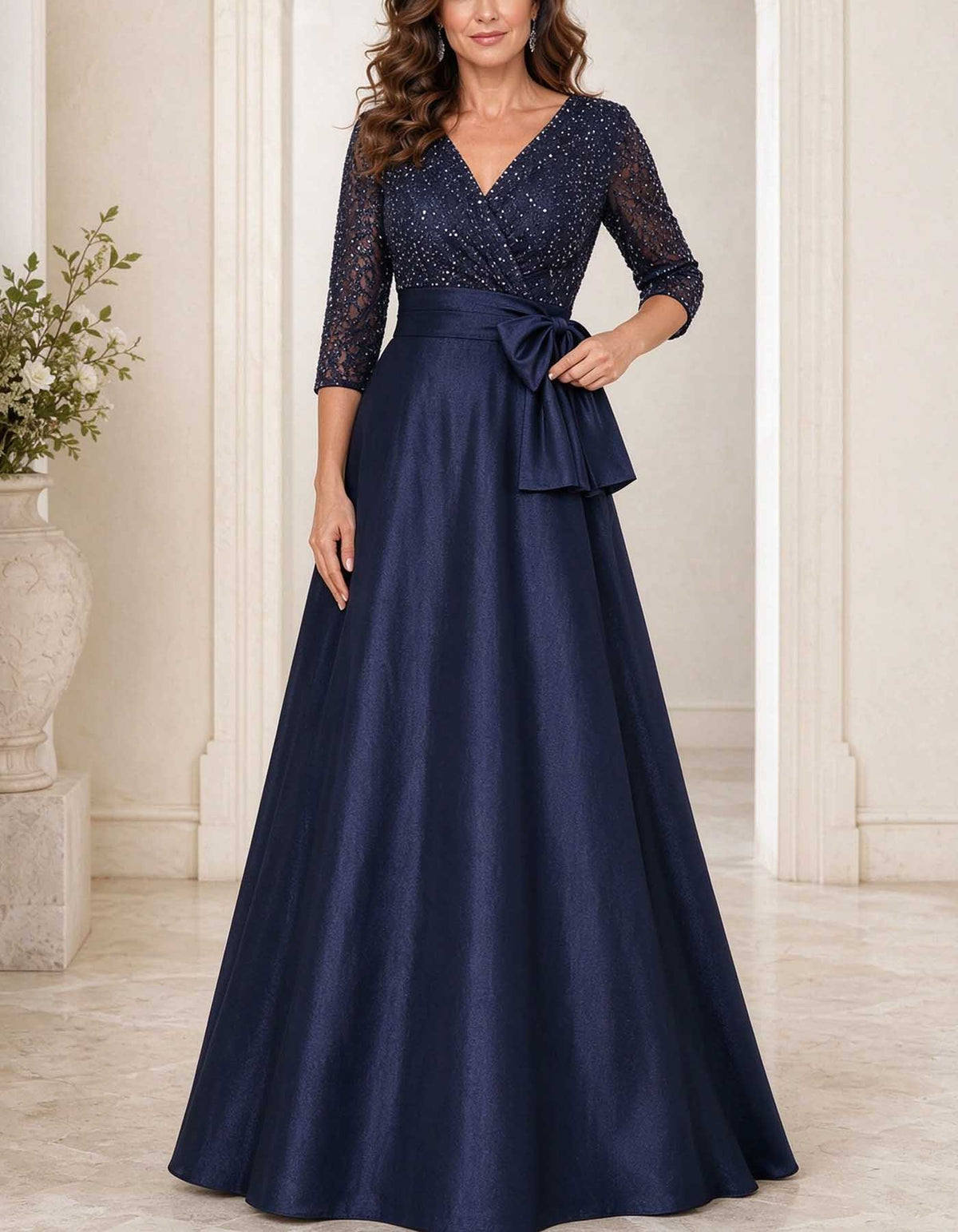 Robe longue bleu marine à décolleté en V, corsage à sequins et nœud en satin