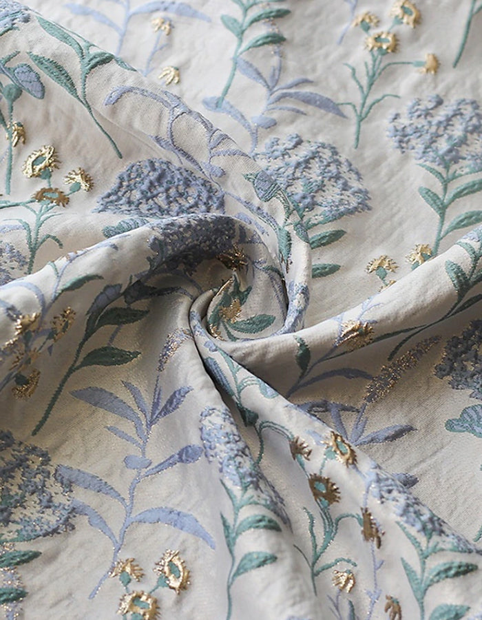 Robe jacquard florale sans manches à col rond et coupe trapèze