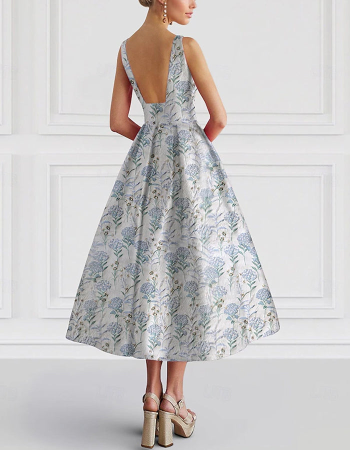 Robe jacquard florale sans manches à col rond et coupe trapèze