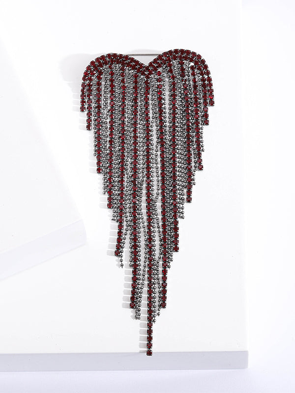 Broche de corazón con borlas