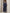 Completo due pezzi blu navy con scollo a V, volant, maniche lunghe e pantaloni a gamba larga