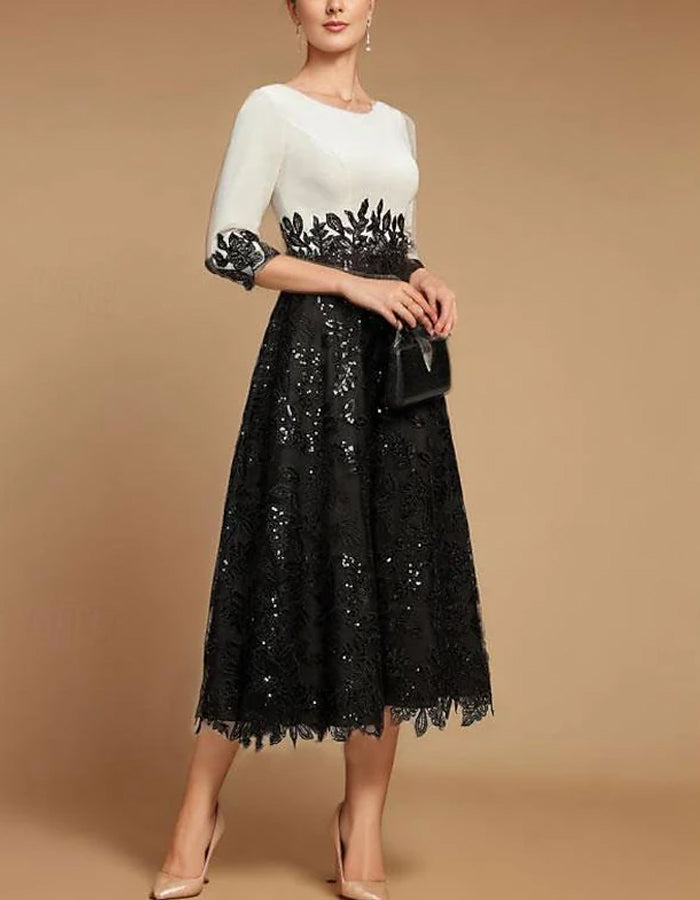 Rochie midi A-line cu dantelă și blocuri de culoare