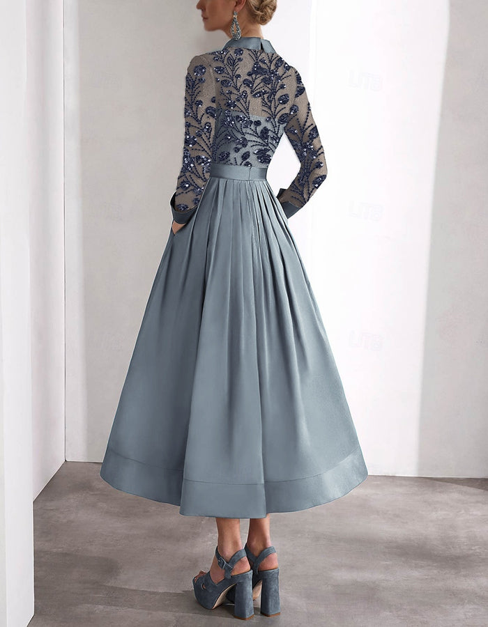 Robe midi chemise brodée à manches longues avec col en satin