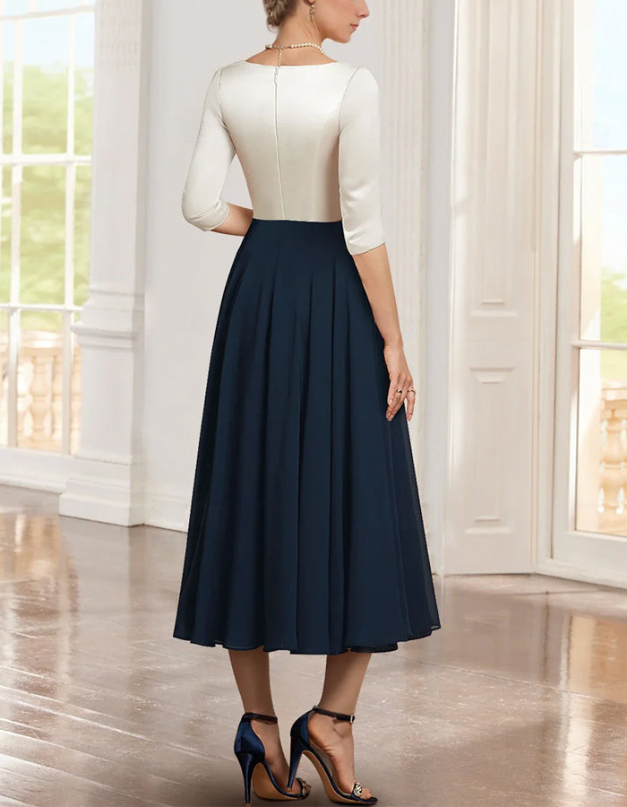 Vestido midi para madre de la novia en satén y gasa con bloques de color y escote en V