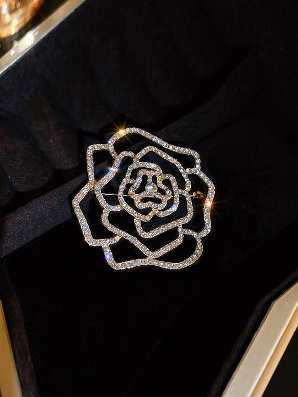 Broche de corazón con borlas