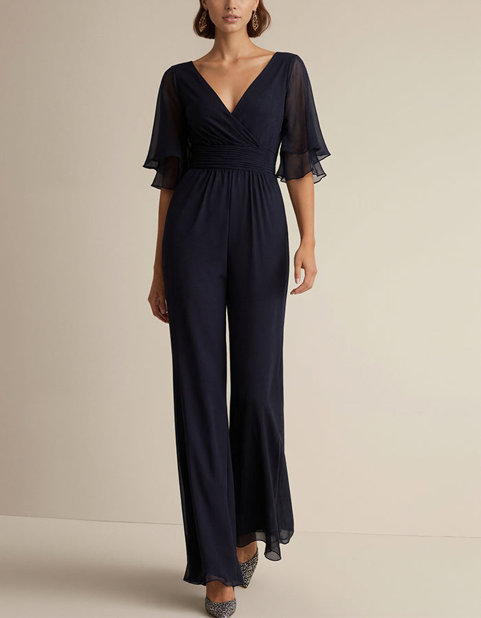 Donkerblauwe jumpsuit met V-hals en korte mouwen van chiffon