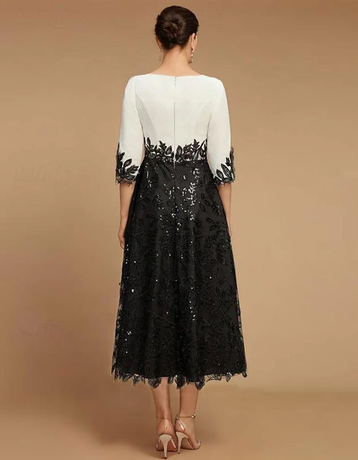 Rochie midi A-line cu dantelă și blocuri de culoare