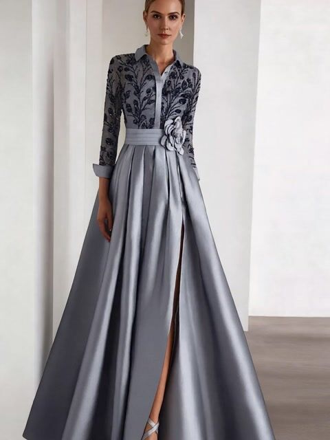 Vestido elegante de satén con corpiño bordado y detalle floral en la cintura