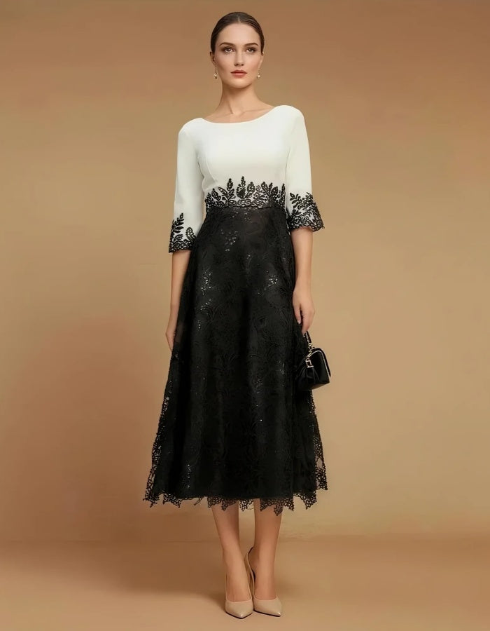 Robe midi évasée en dentelle bicolore  