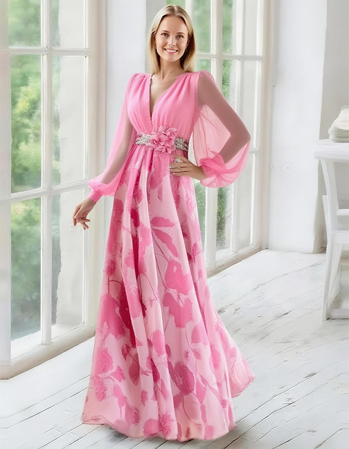Elegante vestido de noche de gasa azul marino con falda estampada floral y mangas obispo transparentes