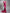 Robe longue rouge rosé en satin à col en V profond, dos nu et fente queue de poisson