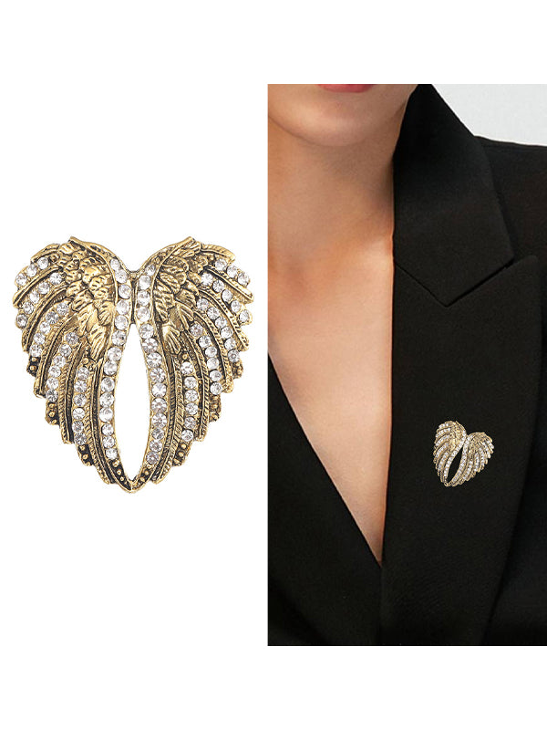 Spilla vintage in lega con diamanti a forma di ali