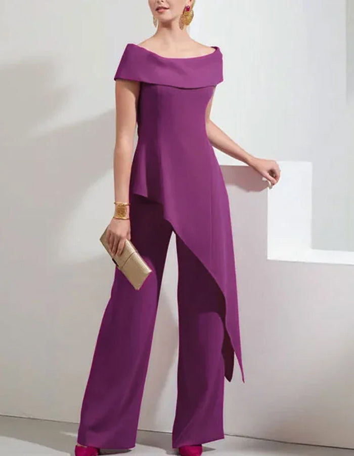 Elegante mono de crepé con superposición drapeada asimétrica y escote Bardot