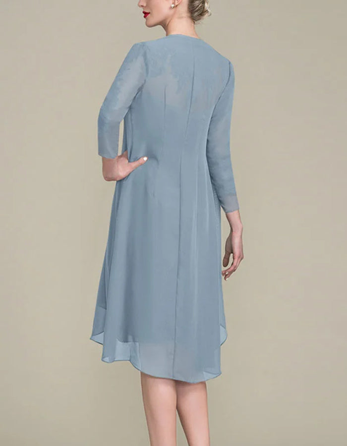 Taille aansluitend chiffon midi-jurk pak