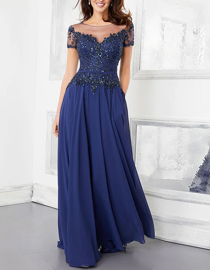 Vestido largo de encaje y gasa con cuello redondo