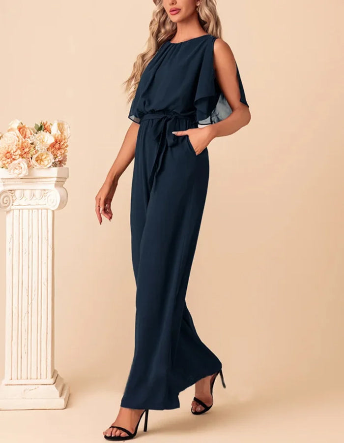 Combinaison en chiffon bleu marine avec manches fluides et ceinture à la taille